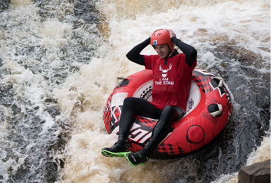 Stag do taking part in white water tubing wit Endless Adventure North East